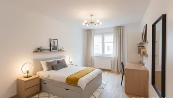 Modern eingerichtetes Schlafzimmer mit Holzboden, großem Fenster und stilvoller Beleuchtung als Einrichtungsbeispiel.