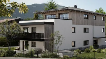 Moderne Architektur mit Holz- und Putzfassade vor bergiger Kulisse und Grünflächen.
