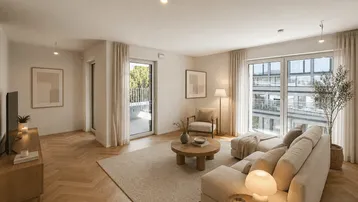 Helles, modern eingerichtetes Wohnzimmer mit Parkettboden und Zugang zum Balkon.