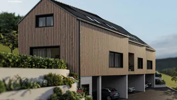 Moderne Reihenhäuser mit Holzfassade, integrierten Carports und terrassierter Gartenanlage.