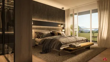 Modernes Schlafzimmer mit dunkler Akzentwand, Einbauschrank und Zugang zu einem Balkon mit Bergblick.