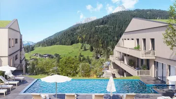 Außenpoolbereich mit Liegestühlen und Blick auf die umliegende Berglandschaft.