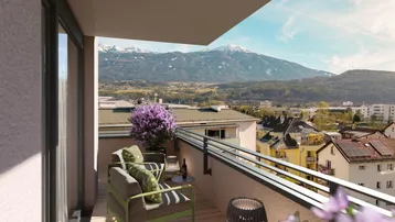Gemütlicher Balkon mit Holzboden und Sitzgelegenheiten bietet einen weiten Bergblick.
