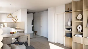 Heller, offener Wohn-Essbereich mit integrierter Küche, modernen Holzdetails und Parkettboden.