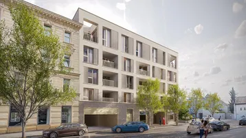 Moderne Wohngebäude-Fassade mit Balkonen und großen Fenstern, umgeben von städtischer Architektur und Bäumen.
