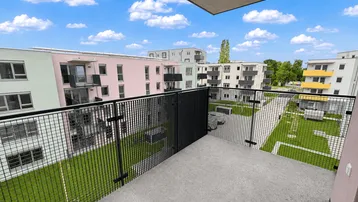 Blick von einem Balkon auf eine moderne Wohnanlage mit begrünten Innenhöfen und Spielplatz.