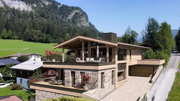 Expose Ihr Chalet-Traum: Grundstück mit Baugenehmigung und Kaiserblick