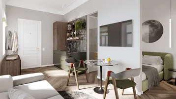 Modernes Studio-Apartment mit offener Küchenzeile, Essbereich und Schlafbereich, ausgestattet mit Parkettboden.