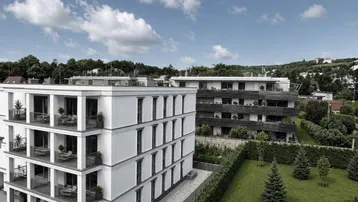 Moderne Wohngebäude mit Balkonen und gepflegten Grünflächen in einer ruhigen Umgebung.