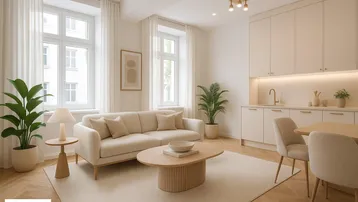 Helles, modern eingerichtetes Wohnzimmer mit integrierter Küchenzeile und Parkettboden.