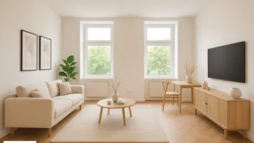 Helles Wohnzimmer mit modernem Mobiliar, Parkettboden und Blick ins Grüne.