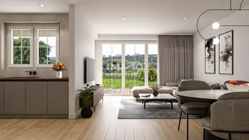 Moderne, offene Wohnküche mit hellem Parkettboden und Zugang zu einer Terrasse mit Grünblick.
