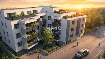 Moderne Wohnanlage mit Balkonen und Dachterrassen bei Sonnenuntergang in urbaner Umgebung.
