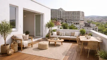 Große Dachterrasse mit Holzboden, bequemen Loungemöbeln und weitem Blick über die Stadt.