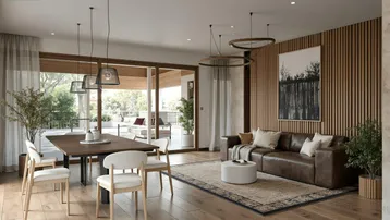 Heller, offener Wohn- und Essbereich mit Holzboden, modernen Möbeln und Zugang zur Terrasse.