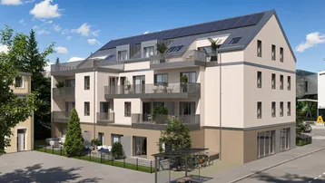 Moderne Wohnanlage mit Balkonen, Solaranlage auf dem Dach und begrüntem Außenbereich.