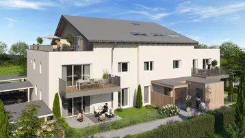 Moderne Wohnanlage mit Balkonen, Terrassen und begrünten Außenbereichen unter blauem Himmel.