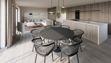 Modernes, offenes Wohn- und Esszimmer mit integrierter Küche und Holzboden.