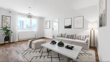 Helles Wohnzimmer mit modernem Design, Holzboden und Blick auf die Stadt.