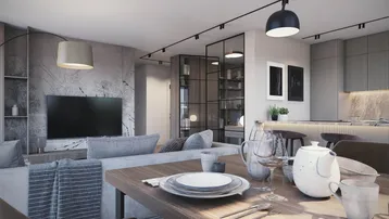 Moderner offener Wohn-Essbereich mit Holztisch, gemütlicher Sitzecke und integrierter Küche im Hintergrund.
