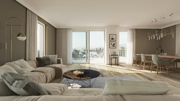 Heller, offener Wohn- und Essbereich mit Zugang zur Terrasse und weitem Ausblick.