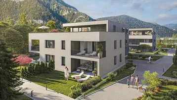 Moderne Wohnanlage mit Terrassen und Balkonen vor einer beeindruckenden Bergkulisse.