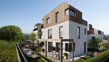 Moderne Architektur mit Holzfassade und einer möblierten Terrasse im Grünen, umgeben von Natur.