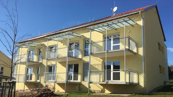 Expose TOP-2-Zimmer-Wohnung mit Balkon und Carportparkplatz - geförderte Miete mit Kaufoption - 2 Zimmer