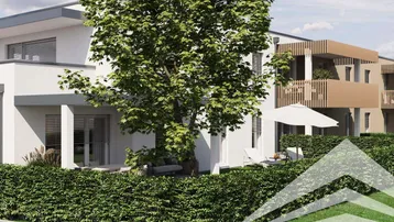 Moderne Wohnanlage mit privater Terrasse und Gartenbereich, umgeben von einer grünen Hecke.