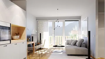 Heller offener Wohnbereich mit Holzboden, integrierter Küche und Zugang zum Balkon mit Bergblick.