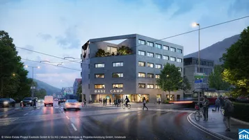 Moderne Architektur eines Gebäudes an einer belebten Straße bei Dämmerung mit Bergkulisse.