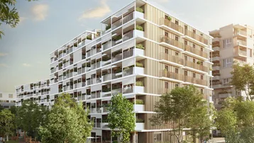 Moderne Wohnanlage mit mehreren Gebäuden, großzügigen Grünflächen und Spielbereichen unter blauem Himmel.