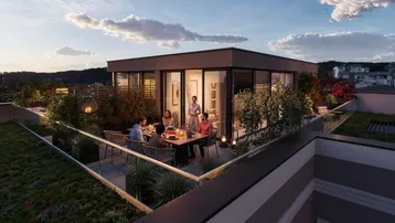 Abendliche Dachterrasse mit Sitzbereich, Pflanzen und Blick auf die Umgebung.