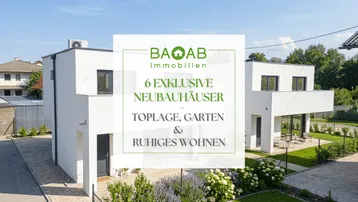 Luftaufnahme von zwei modernen Neubauhäusern mit minimalistischer Architektur und gepflegten Gärten.