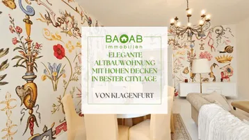 Eleganter Wohn- und Essbereich mit auffälliger, farbenfroher Tapete, Kronleuchter und hohen Decken.