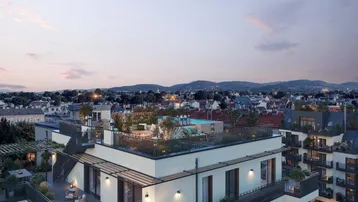 Moderne Wohnanlage mit Dachterrasse, Pool und weitem Blick über die Stadt und Berge.