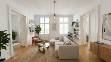 Helles Wohnzimmer mit modernem Ecksofa, Fischgrätparkett und hohen Decken.