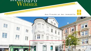 Außenansicht des historischen Gebäudes mit einer Werbeüberlagerung und markiertem Erdgeschossbereich.