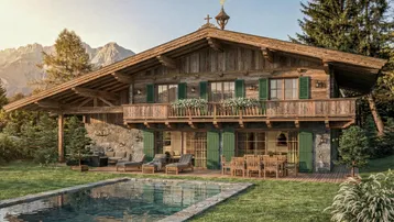 Luxuriöses Holzchalet mit Bergblick, großem Pool und einladender Terrasse für Mahlzeiten im Freien.