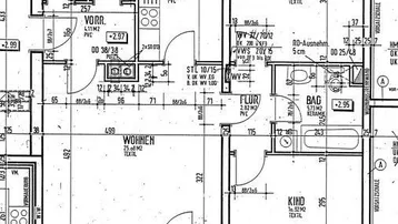 Grundriss einer Wohnung mit Wohnzimmer, Küche, zwei Schlafzimmern, zwei Bädern und Balkon.