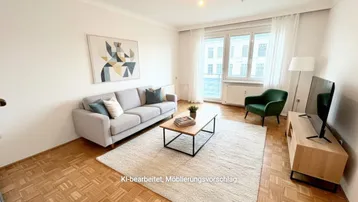 Helles Wohnzimmer mit modernem Mobiliar, Parkettboden und Zugang zum Balkon.