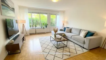 Helles Wohnzimmer mit Parkettboden, großen Fenstern und modernem Mobiliar, das zum Entspannen einlädt.