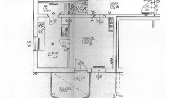 Grundriss einer Wohnung mit Wohnzimmer, Küche, zwei Schlafzimmern, Bad, WC, Loggia und Balkon.