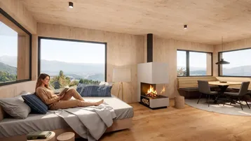 Gemütlicher Wohn-Essbereich mit modernem Kamin, Holzwänden und großen Fenstern mit weitem Bergblick.