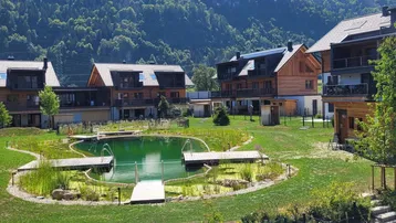 Expose Alpiner Wohnstil in beeindruckender Bergkulisse – mit exklusivem Bio-Schwimmteich