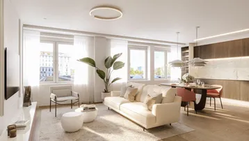Heller, offener Wohn- und Essbereich mit moderner Küche und großen Fenstern, ideal für geselliges Beisammensein.