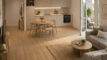 Heller offener Wohn-Essbereich mit moderner Einbauküche und Zugang zu einem Balkon.