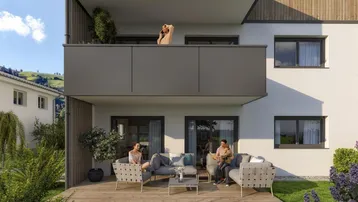 Moderne Terrasse und Balkon mit Sitzgelegenheiten und Blick auf die umliegende Berglandschaft.