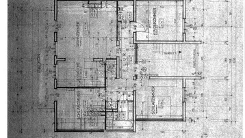Grundriss einer Wohnung mit Wohnzimmer, Essküche, drei Schlafzimmern, Bad, separatem WC und Balkon.