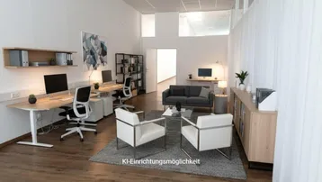 Modernes Büro mit mehreren Arbeitsplätzen und einem gemütlichen Loungebereich, hell und offen gestaltet.
